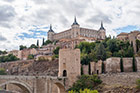 Toledo. Widok na Alcazar i zabytkowy most Puente de Alcantara. - foto: wnieznane.pl Toledo. Widok na Alcazar i zabytkowy most Puente de Alcantara. - foto: wnieznane.pl