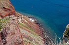 Santorini, Oia. Wyspa zbudowana jest z czerwonych i czarnych skał wulkanicznych. - foto: wnieznane.pl Santorini, Oia. Wyspa zbudowana jest z czerwonych i czarnych skał wulkanicznych. - foto: wnieznane.pl